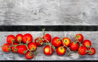 rústico cocina antecedentes con Cereza Tomates ru foto