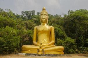 big golden buddha at Wat pa sawang boon temple in Saraburi Province of Thailand. photo