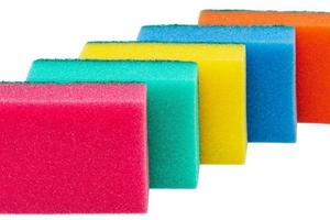 Set of different bright colored foam sponges for everyday cleaning in kitchen and washing dishes photo