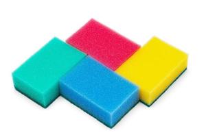 Group of foam sponges of bright colored for everyday washing and cleaning of kitchen utensils photo