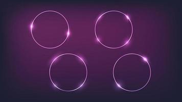 Set of four neon circle frames with shining effects on dark background. Empty glowing techno backdrop. Vector illustration