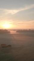 Sun light shines over foggy landscape video