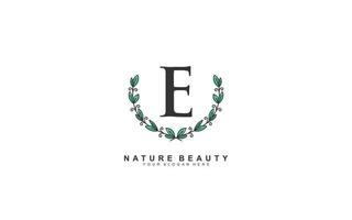 E beauty floral logo design inspiration. Vector letter wedding template design for brand.