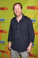 Joss Whedon  arriving at the FOXFall EcoCasino Party at BOA Steakhouse  in West Los Angeles CA on September 14 20092009 photo