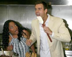 Sherri Shepherd and Cameron Mathison in the Wolfgang Puck Catering kitchen demonstrating and trying the deserts for the Daytime Emmy dinner adjacent to the Kodak Theater piror to Daytime Emmys at the Kodak Theater in Hollywood, CA June 19, 2008 photo