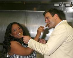 Sherri Shepherd and Cameron Mathison in the Wolfgang Puck Catering kitchen demonstrating and trying the deserts for the Daytime Emmy dinner adjacent to the Kodak Theater piror to Daytime Emmys at the Kodak Theater in Hollywood, CA June 19, 2008 photo
