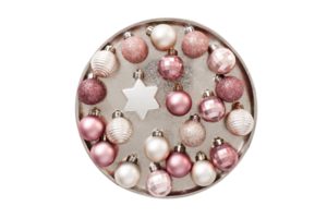 Pink christmas ball on a gold plate isolated on a transparent background png