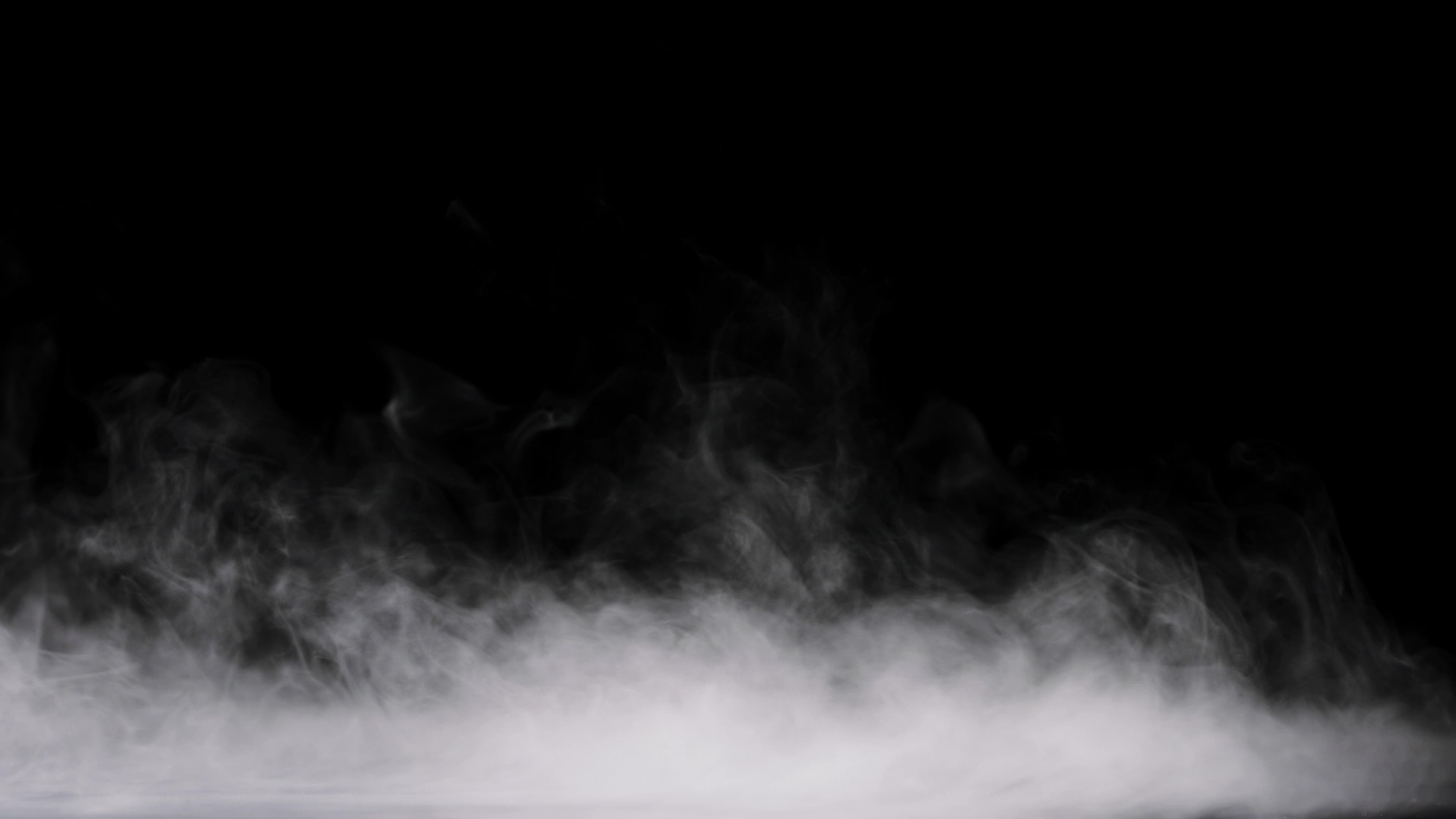 fog spreading on black background 21290315 Stock Video at Vecteezy