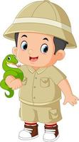 an adventurous boy posing with a green snake vector