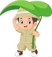 an adventurous boy walks with a large leaf as an umbrella vector