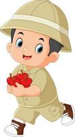 an adventurous boy excited and running carrying lots of apples vector