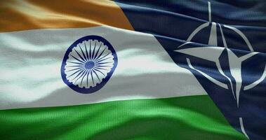 India and NATO relationship. Politics and diplomacy news. Waving flag background video