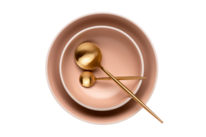 Pink plates and gold spoons isolated on a transparent background png