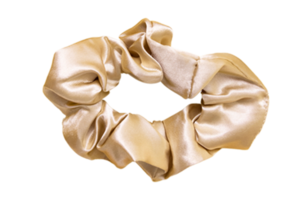 Golden cotton scrunchy isolated on a transparent background png