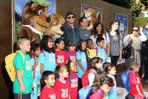 LOS ANGELES  DEC 11  Justin Timberlakem with students who won contect for being most imrproved arrives at the Yogi Bear 3D Premiere at The Village Theater on December 11 2010 in Westwood CA photo