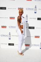 Amber Rose arriving at the White Party hosted by Sean Diddy Combs  Ashton Kutcher in Beverly Hills CA on July 4 2009 2008 photo