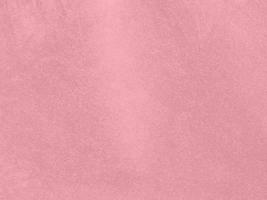 rose gold color velvet fabric texture used as background. Empty pink gold fabric background of soft and smooth textile material. There is space for text.. photo