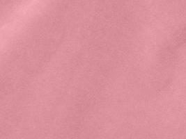 rose gold color velvet fabric texture used as background. Empty pink gold fabric background of soft and smooth textile material. There is space for text.. photo
