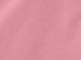 rose gold color velvet fabric texture used as background. Empty pink gold fabric background of soft and smooth textile material. There is space for text.. photo