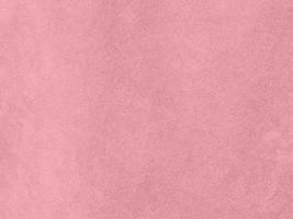 rose gold color velvet fabric texture used as background. Empty pink gold fabric background of soft and smooth textile material. There is space for text.. photo