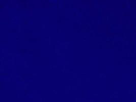 Blue velvet fabric texture used as background. Empty blue fabric background of soft and smooth textile material. There is space for text. photo