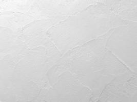 Seamless texture of white cement wall a rough surface, with space for text, for a background. photo