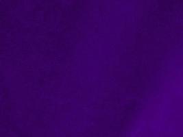 Purple velvet fabric texture used as background. Empty purple fabric background of soft and smooth textile material. There is space for text. photo