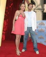 Susie Castillo and guest arriving  at the MTV Movie Awards at the Shrine Auditorium Los Angeles CAJune 4 20052005 photo