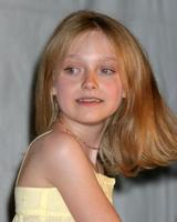Dakota Fanning in the press room after winning an award for the scariest performer at the MTV Movie Awards at the Shrine Auditorium Los Angeles CAJune 4 20052005 photo