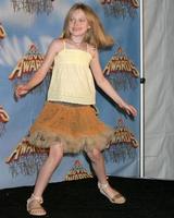 Dakota Fanning in the press room after winning an award for the scariest performer at the MTV Movie Awards at the Shrine Auditorium Los Angeles CAJune 4 20052005 photo