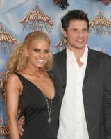 Jessica Simpson and Nick Lacheyarriving  at the MTV Movie Awards at the Shrine Auditorium Los Angeles CAJune 4 20052005 photo