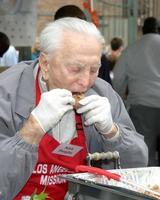 Celebrities Help to serve Thanksgiving Dinner to the homeless at the LA Mission in Downtown LALos Angeles CANovember 23 20052005 photo