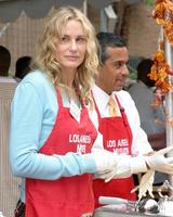 Celebrities Help to serve Thanksgiving Dinner to the homeless at the LA Mission in Downtown LALos Angeles CANovember 23 20052005 photo