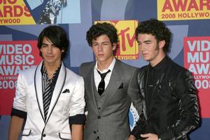 Jonas Brothers arriving at  the Video Music Awards on MTV at Paramount Studios in Los Angeles CA onSeptember 7 20082008 photo