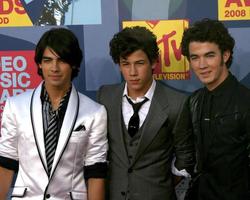 Jonas Brothers arriving at  the Video Music Awards on MTV at Paramount Studios in Los Angeles CA onSeptember 7 20082008 photo