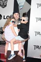 Travis Barker  kids arriving at the Transformers Revenge of the Fallen Premiere at the Manns Village Theater in Westwood CA  on June 22 2009  2009 photo