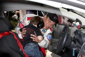 Carlos Mencia  Son Lucas Pablo Mencia  at the  Toyota ProCeleb Race Day on April 18 2009 at the Long Beach Grand Prix course in Long Beach California2009 photo