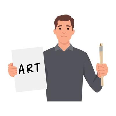 Young man holding paper with art written on it and holding paint brushes ready to paint. Art student.