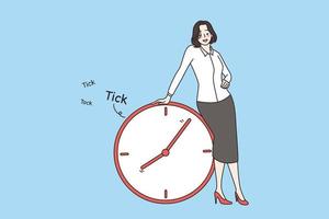 Time management and deadline concept. Young smiling businesswoman cartoon character standing and touching huge alarm clock with running time vector illustration