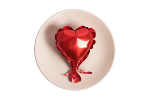 Beige plate and red heart balloon isolated on a transparent background png