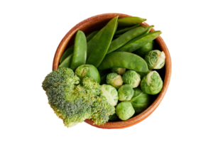 Plate with green vegetables isolated on a transparent background png