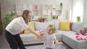 Mom and daughter are dancing and having fun at home. Mom and daughter are dancing and having fun at home. video