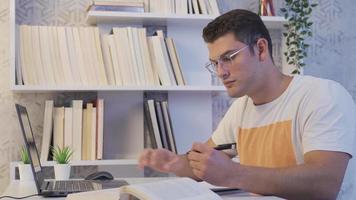 University student studying. University student doing his lecture. video