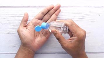 young man using hand sanitizer video