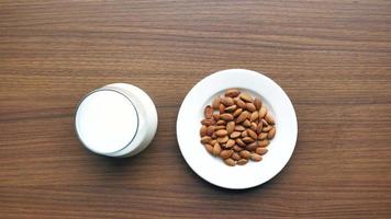 Almond nut and milk on table video