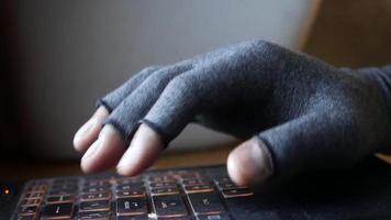 close up of hacker hand typing on keyboard video