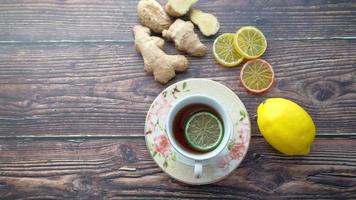 close up of dry lemon, ginger and green tea on table video