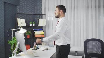 Exercises that can be done in the office. Stretching exercises. Office worker showing exercises that can be done in the office. video