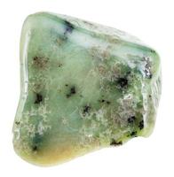 pulido verde grosularia granate piedra preciosa aislado foto