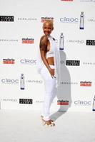 Amber Rose arriving at the White Party hosted by Sean Diddy Combs  Ashton Kutcher in Beverly Hills CA on July 4 2009 2008 photo